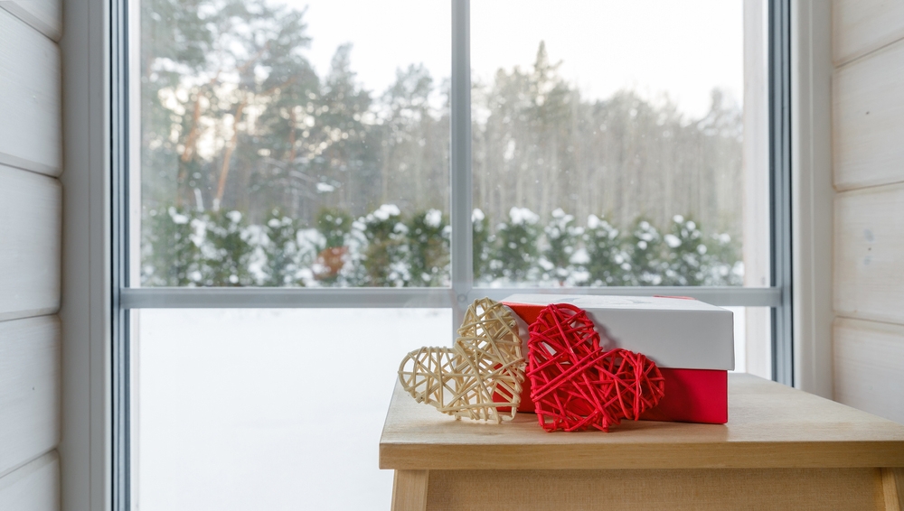 Snowy Window With Cuddling Hearts